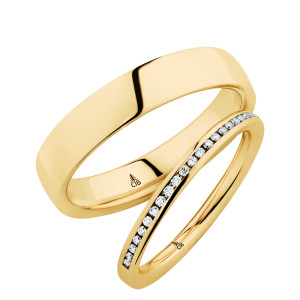 Christian Bauer 280154 18 karat yellow gold wedding band, angled view of a gently domed polished face with rounded edges, the surface running straight into a polished interior, shown with its matching ring