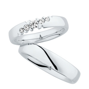 Christian Bauer 280165 platinum wedding band, angled view of a full rounded dome with a bright polished surface and a polished interior, no edge treatment, shown with its matching ring