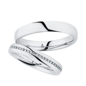 Christian Bauer 280193 platinum wedding band, angled view of a rounded polished dome, the bright surface running unbroken into a polished interior, shown with its matching ring