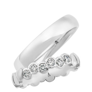 Christian Bauer 280252 18 karat white gold wedding band, angled view of a softly domed polished profile with rounded edges and a mirror polished interior, shown with its matching ring