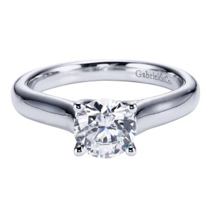 Gabriel & Co. ER6601PTJJJ platinum Contemporary engagement ring, front view of a round center held by four slim prongs on a rounded tapered shank