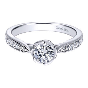 Gabriel & Co. ER910067W44JJ 14 karat white gold Contemporary engagement ring, top view of the round center clasped by curled ribbons above bead set shoulders