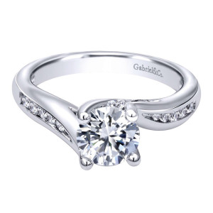 Gabriel & Co. ER10793W44JJ 14 karat white gold Victorian engagement ring, front view of a round center between channel set rows sunk into the shoulders