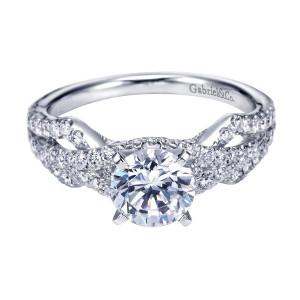 Gabriel & Co. ER7548W44JJ 14 karat white gold Contemporary engagement ring, angled view of the round center above interlacing pave strands that widen across the shoulders