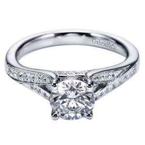 Gabriel & Co. ER6389W44JJ 14 karat white gold Contemporary engagement ring, angled view of the round center above bead set rows bordered by polished edges