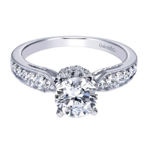 Gabriel & Co. ER4099W44JJ 14 karat white gold Victorian engagement ring, front view of the round center held by four prongs above a pave collar, milgrain edges