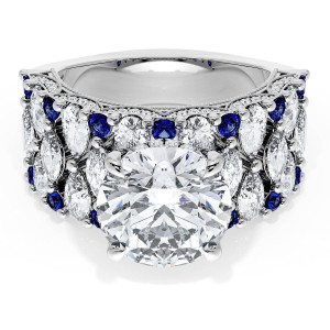 21RD10BS112W top view, white gold wide band with round brilliant center, marquise and pear diamonds and blue sapphire accents