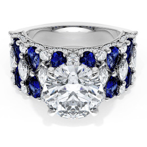 21RD10BS212W top view, round brilliant center stone on a wide white metal band of blue sapphires and diamonds