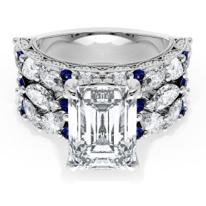 22EC11X8BS112W top view, emerald cut center on a wide white gold band with marquise diamonds and blue sapphire accents