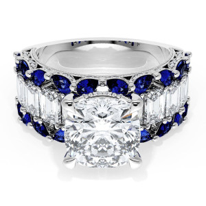 23CU9BS112 Platinum top view, cushion center stone with a step cut diamond row bordered by blue sapphires