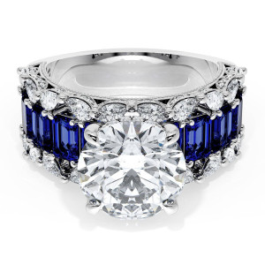 23RD10BS212 Platinum top view, round brilliant center over a row of emerald cut blue sapphires with diamond borders