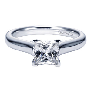 Gabriel & Co. ER6606PTJJJ platinum Contemporary engagement ring, front view of the princess center on corner tabs above shoulders that curve outward smoothly