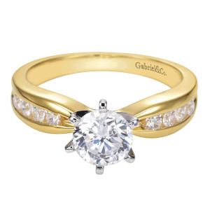Gabriel & Co. ER1726M43JJ two-tone 14 karat gold Contemporary engagement ring, front view of the round center in a six prong head above channel set rounds