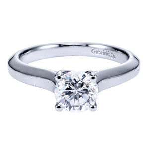 Gabriel & Co. ER6611PTJJJ platinum Contemporary engagement ring, front view of the round center held by four rounded bead tip prongs above a tapered shank