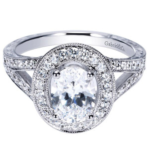 Gabriel & Co. ER8806W44JJ 14 karat white gold Victorian engagement ring, front view of the oval center inside a wide milgrain rimmed halo above a split shank