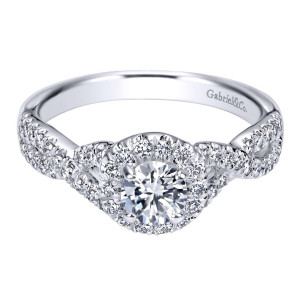 Gabriel & Co. ER910100W44JJ 14 karat white gold Contemporary engagement ring, angled view of the round center in a single halo above woven criss cross pave rows