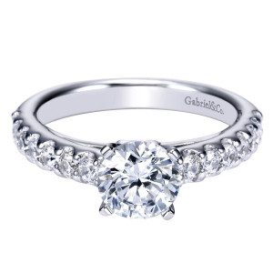 Gabriel & Co. ER4245W44JJ 14 karat white gold Contemporary engagement ring, front view of the round center with evenly sized rounds running well past the shoulders