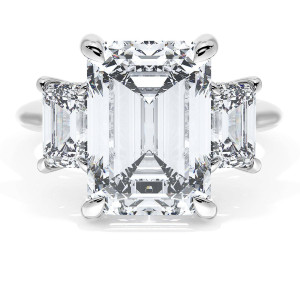 41227EC12X85W white gold ring top view, emerald cut center stone flanked by two smaller step cut diamonds