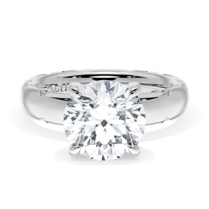 4144RD9 Platinum top view, round brilliant center on a polished white metal band with milgrain crescent edges