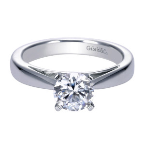 Gabriel & Co. ER8132PTJJJ platinum Contemporary engagement ring, front view of the round center in flat tab prongs on a smooth tapering shank