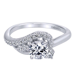 Gabriel & Co. ER910072W44JJ 14 karat white gold Contemporary engagement ring, front view of a round center with a pave crescent arching across one shoulder