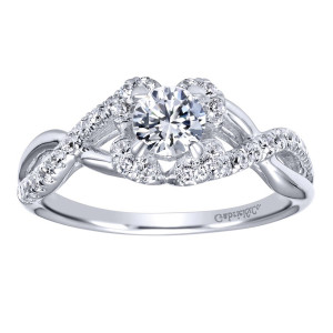 Gabriel & Co. ER910155W44JJ 14 karat white gold Contemporary engagement ring, front view of the round center in a loose petal halo above crossing open loops