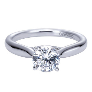 Gabriel & Co. ER7894W4JJJ 14 karat white gold Contemporary engagement ring, front view of the round center on four slim prongs above a smooth unadorned rim