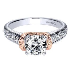 Gabriel & Co. ER9238T44JJ two-tone 14 karat gold Contemporary engagement ring, top view of the round center clasped by engraved scroll arms above bead set rows