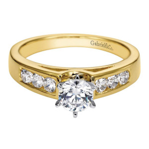 Gabriel & Co. ER2352M43JJ two-tone 14 karat gold Contemporary engagement ring, front view of the round center set low between channel rows that stop short of it