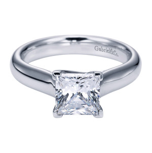 Gabriel & Co. ER6607PTJJJ platinum Contemporary engagement ring, front view of the square center clasped by flat corner tabs above a slim rounded shank