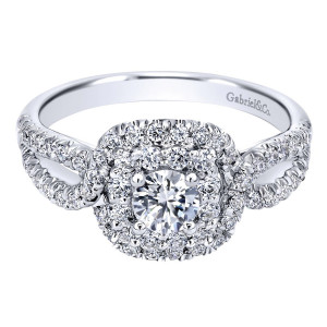 Gabriel & Co. ER910157W44JJ 14 karat white gold Contemporary engagement ring, angled view of a cushion double halo with pave shoulders weaving into an open twist