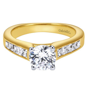 Gabriel & Co. ER3964M44JJ two-tone 14 karat gold Contemporary engagement ring, front view of the round center held by four prongs above channel set square shoulder stones