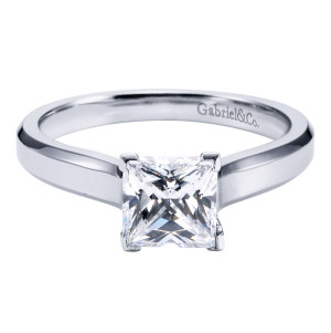 Gabriel & Co. ER6576PTJJJ platinum Contemporary engagement ring, front view of a square center gripped at the corners by four claws on a flat shank