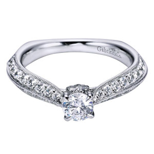 Gabriel & Co. ER96094W44JJ 14 karat white gold Victorian engagement ring, angled view of a round center held in four prongs above tapering stone rows