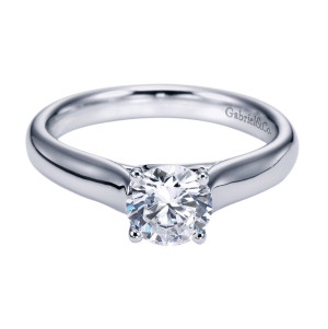 Gabriel & Co. ER6600PTJJJ platinum Contemporary engagement ring, front view of a round center in four small bead prongs above a slender shank