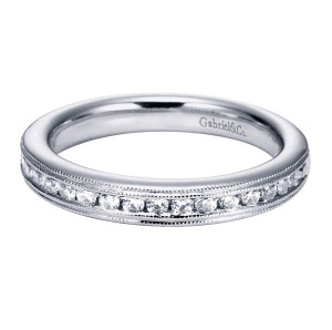 Gabriel & Co. WB5954W44JJ 14 karat white gold Victorian wedding band, front view of a channel set row of round stones between milgrain edged rails