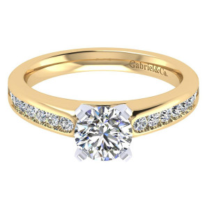 Gabriel & Co. ER8195M44JJ two-tone 14 karat gold Contemporary engagement ring, front view of the round center with channel set rounds recessed into wide flat shoulders