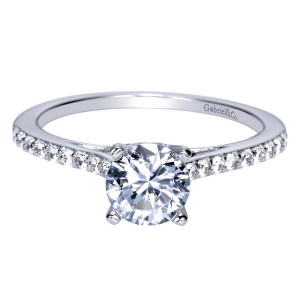 Gabriel & Co. ER8060W44JJ 14 karat white gold Contemporary engagement ring, front view of the round center in four prongs above a slender single pave row