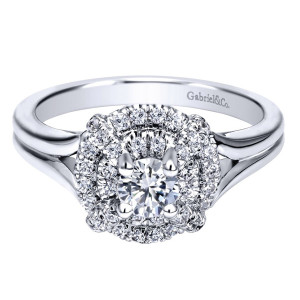 Gabriel & Co. ER910143W44JJ 14 karat white gold Contemporary engagement ring, angled view of the round center in a double halo above a polished split shank