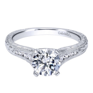 Gabriel & Co. ER10276W44JJ 14 karat white gold Victorian engagement ring, front view of a round center in four prongs between milgrain edged rows of small rounds