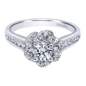 Gabriel & Co. ER910138W44JJ 14 karat white gold Contemporary engagement ring, top view of the round center ringed by lobed cluster halo above a tapering shoulder row
