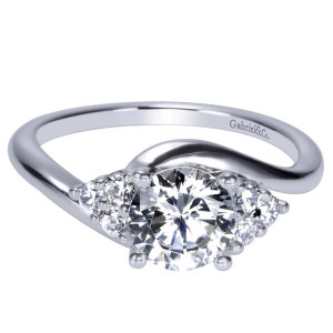 Gabriel & Co. ER8951W44JJ 14 karat white gold Contemporary engagement ring, front view of a round center with a cluster of small rounds at each side