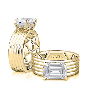 A.JAFFE MECEC3583Q/310 14 Karat engagement ring, yellow gold east west emerald cut ring, upright profile view with a reclining view of the coil band