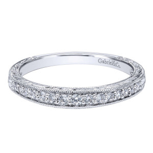 Gabriel & Co. WB10277W44JJ 14 karat white gold Victorian wedding band, angled view of a stone row bordered by deeply carved leaf engraving along the top