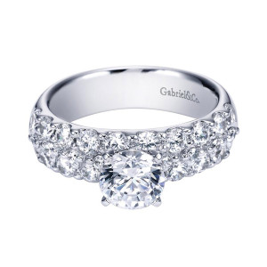 Gabriel & Co. ER4011W44JJ 14 karat white gold Contemporary engagement ring, front view of the round center above two staggered rows of prong set rounds