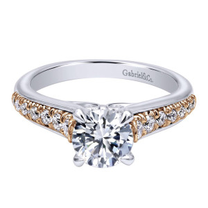 Gabriel & Co. ER10765T44JJ two-tone 14 karat gold Contemporary engagement ring, top view along the shared prong accent row inset into each shoulder beside the head