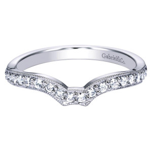 Gabriel & Co. WB4353W44JJ 14 karat white gold Victorian wedding band, angled view of the contoured dip with round stones bead set inside milgrain rails