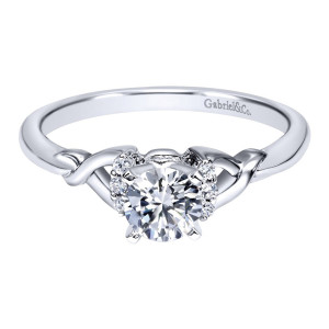 Gabriel & Co. ER10498W44JJ 14 karat white gold Contemporary engagement ring, front view of the round center flanked by small curved accent rows above knotted polished shoulders