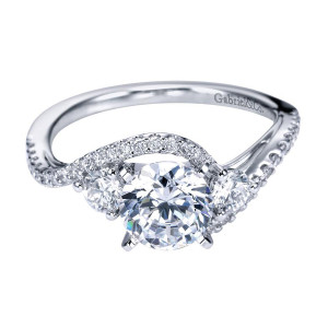 Gabriel & Co. ER7457W44JJ 14 karat white gold Contemporary engagement ring, front view of a round center with two round side stones between pave sweeps