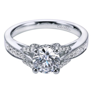 Gabriel & Co. ER6358W44JJ 14 karat white gold Contemporary engagement ring, front view of the round center gripped by ball tipped prongs above split stone rows